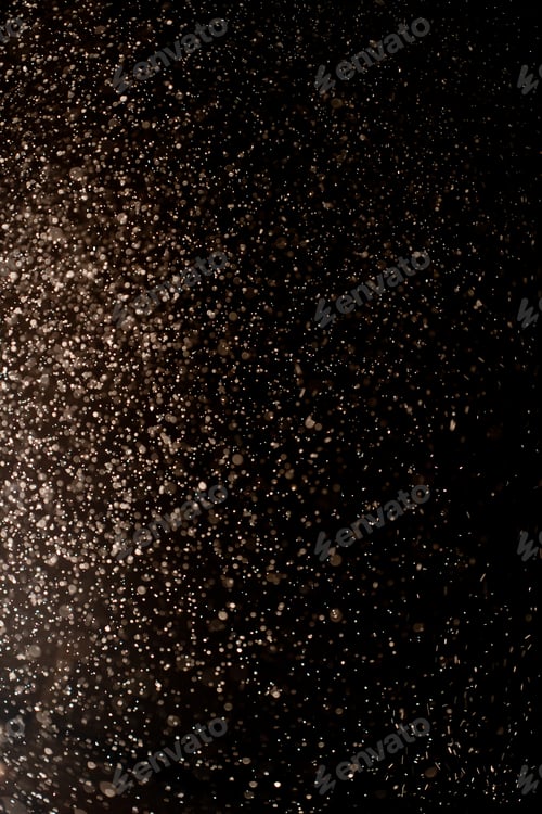 Preview: Gold dust particles abstract Bokeh star particle on Black Background. Futuristic glittering dots in
