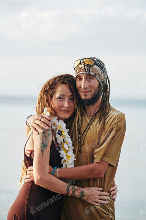 Preview: Loving Couple Embracing on a Sandy Beach