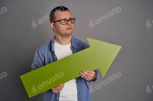 Preview: Caucasian man with down syndrome showing on gray background