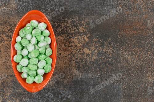 Preview: Yummy menthol candies in orange bowl