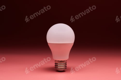 Preview: Light bulb, copy space. Energy saving minimal idea concept.Pink background.
