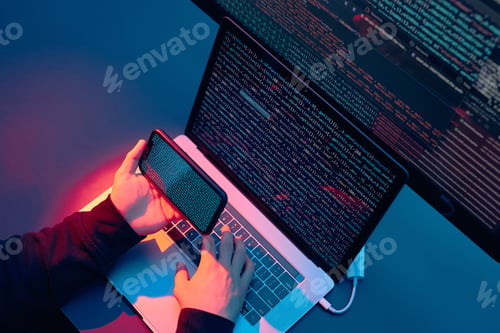 Preview: Man using computer and programming to break code. Cyber security threat. Cyber hacker attack