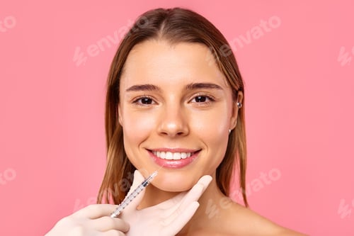Preview: A woman is receiving a facial treatment at a salon to achieve a glowing and youthful look