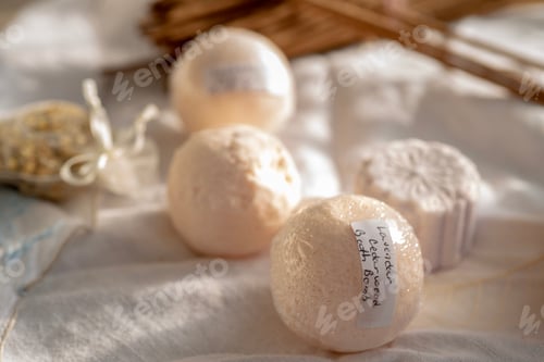 Preview: Relaxing Bath Bombs and Ingredients on White Cloth
