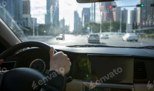 Preview: Driving car in modern city
