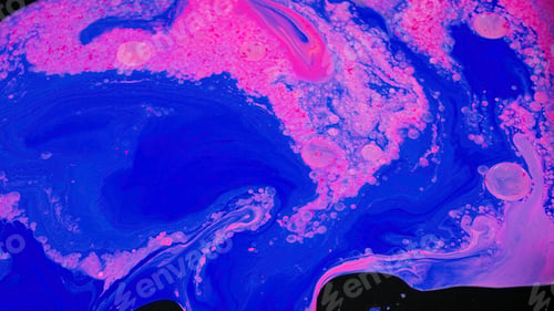 Preview: Beautiful mixing of blue and pink colors. Stock footage. Artistic background with mixing in stream