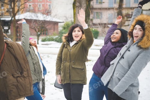 Preview: group of young multiracial women dancing in park