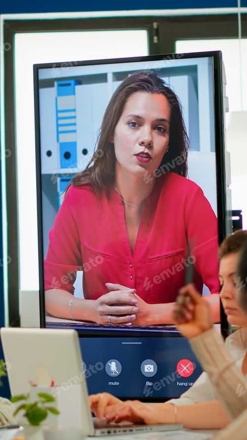 Preview: Multietchincal team listening confident businesswoman webinar speaker coach