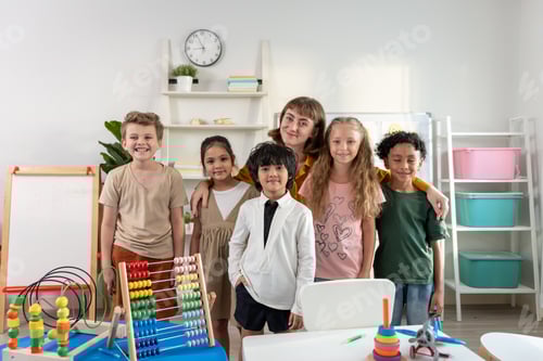 Preview: Portrait of diversity adorable student standing with teacher at school.