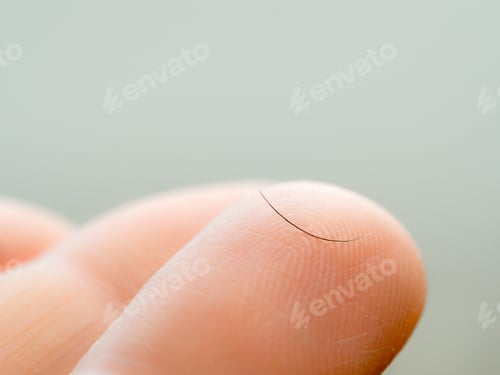 Preview: One dropped eyelash on finger, macro shoot