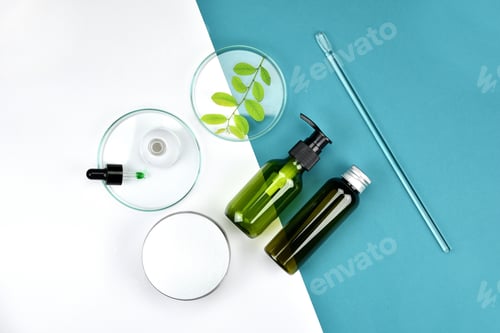 Preview: Cosmetic bottle containers with green herbal leaves