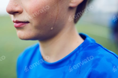 Preview: Close-up of boy (12-13) sweating