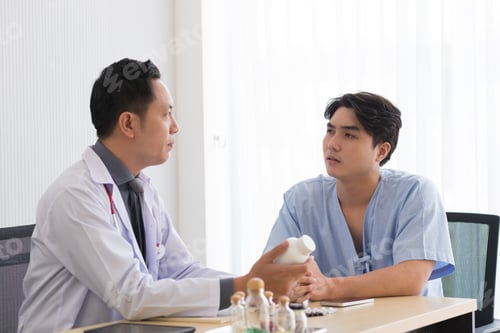 Preview: Asian doctor in professional work uniform discuss and explain symptoms to his patient.