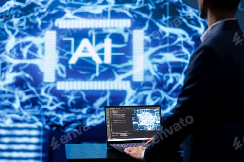 Preview: Programmer using AI cognitive computing on laptop