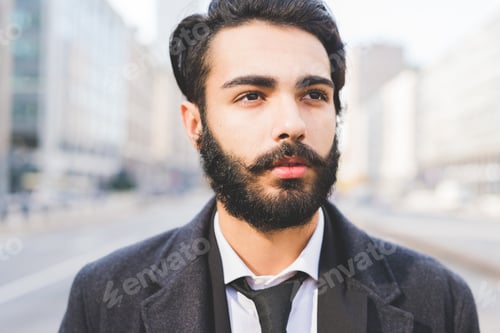 Preview: Young businessman posing outdoor