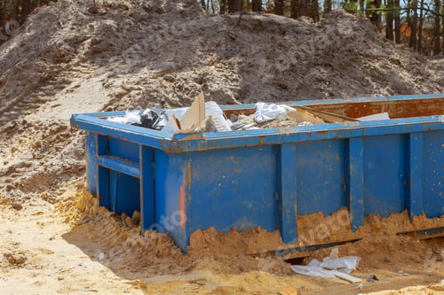 Preview: Construction trash dumpsters on metal container, house renovation.
