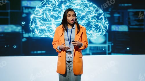 Preview: Speaker talking with audience on stage at AI conference