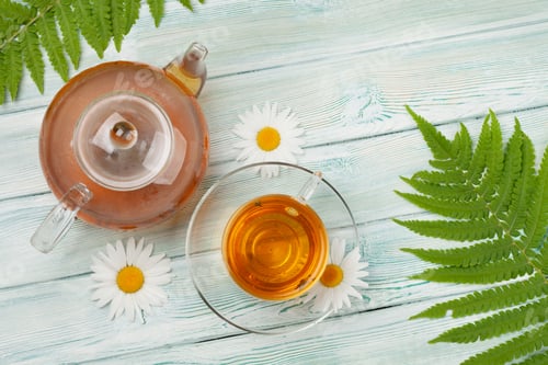 Preview: Herbal tea in teapot and cup