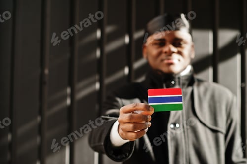 Preview: Young african man hold flag