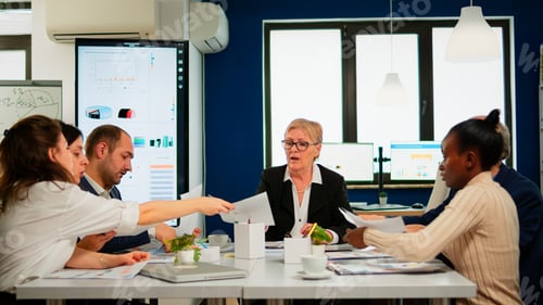 Preview: Start up team meeting with company leader planning financial strategy