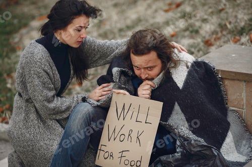 Preview: Homeless man in a durty clothes autumn city