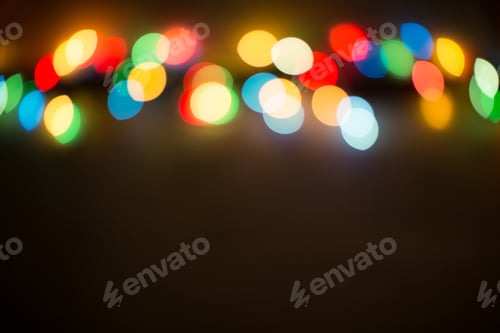 Preview: Bokeh Lights. Color Light On Black Background. Christmas Or Other Holiday Decorations, Garland