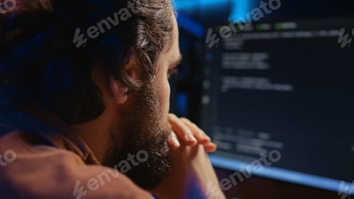 Preview: IT admin frowning while looking at screen, confused by errors, close up shot