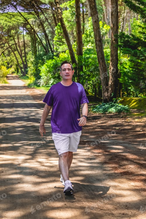 Preview: Male athlete walking after running outdoors