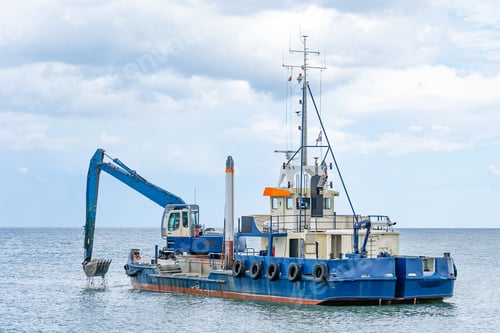 Preview: ship with excavator for dredging the entrance to the port