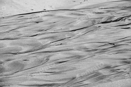 Preview: Perfect abstract pattern of sea sand formed after the tide