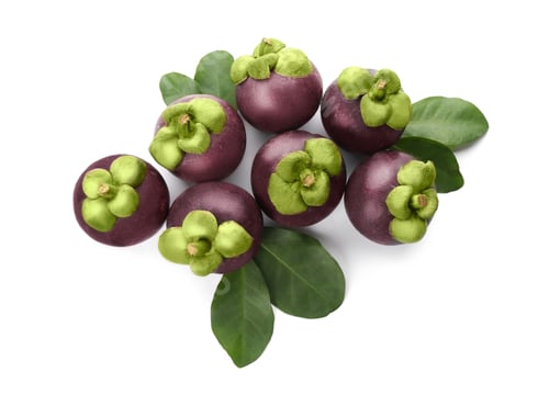 Preview: Fresh mangosteen fruits with green leaves on white background, top view