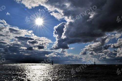 Preview: Beautiful cloudy sky at sunset on Lake Michigan