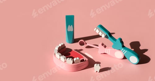 Preview: A model of a jaw with a lost tooth and tools for daily dental care
