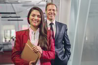 Preview: Pleased office workers looking straight at camera