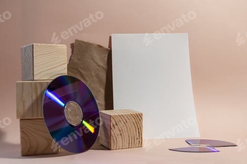 Preview: Retro styled still life with wooden cubes, cd and empty paper