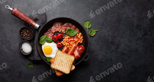 Preview: English breakfast with fried eggs, beans, bacon and sausages