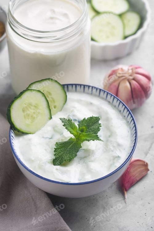 Preview: Traditional Indian Raita with Dahi in a bowl. Close up shot