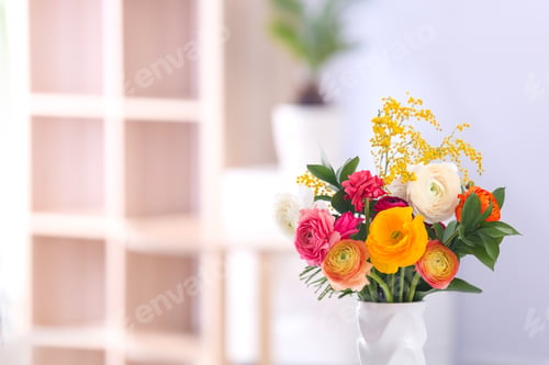 Preview: Vase with beautiful ranunculus flowers on blurred background