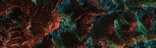 Preview: panoramic shot of abstract background of shiny textured crumpled foil with colorful lighting