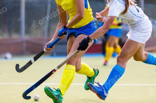 Preview: Close up image of fighting for the ball in field hockey game