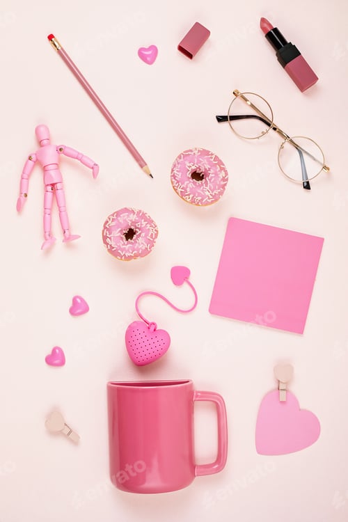 Preview: Flat lay with pink accessories, tea cup, donuts, glasses, lipstick over light pink background