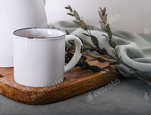 Preview: vintage metal teapot and mug with tea