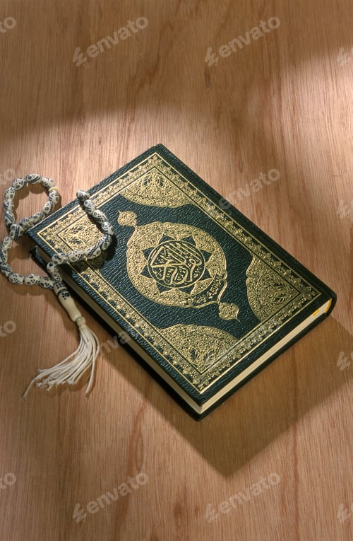 Preview: Koran book close up on wooden background