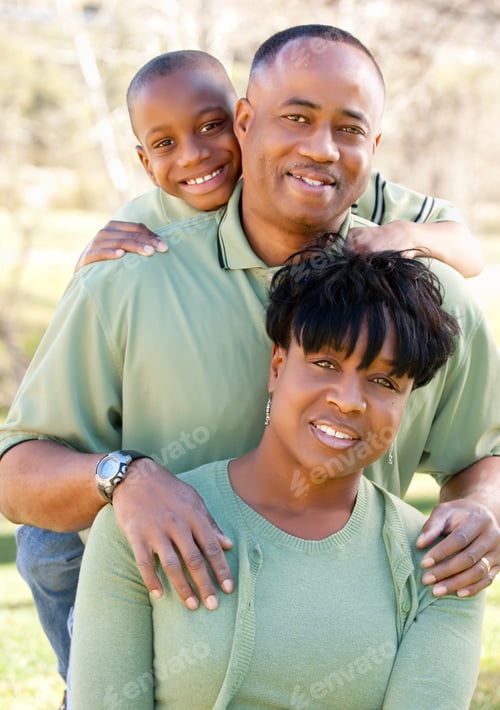 Preview: Affectionate Family Posing Together in a Suburban Garden