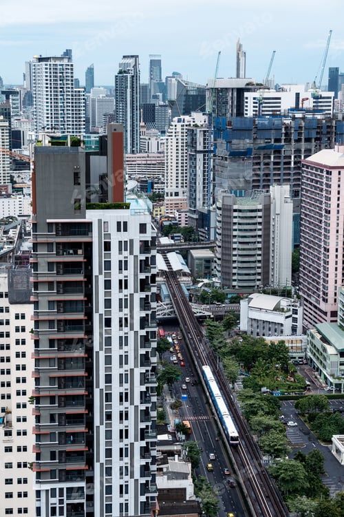 Preview: Bangkok city with crowded building and public skytrain at Thailand