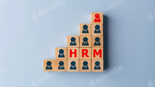 Preview: HRM - Human resource management and recruitment concept on wooden cubes.