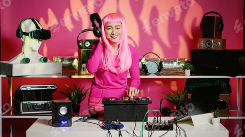 Preview: Cheerful performer playing techno music