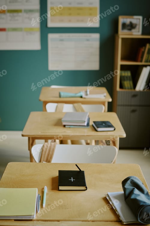 Preview: Desks and Books in Classroom Environment