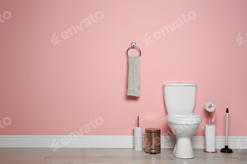 Preview: New ceramic toilet bowl in modern bathroom with space for text