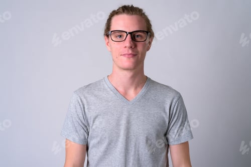 Preview: Face of young handsome man with eyeglasses